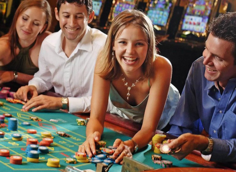 Happy Gamblers Playing Roulette