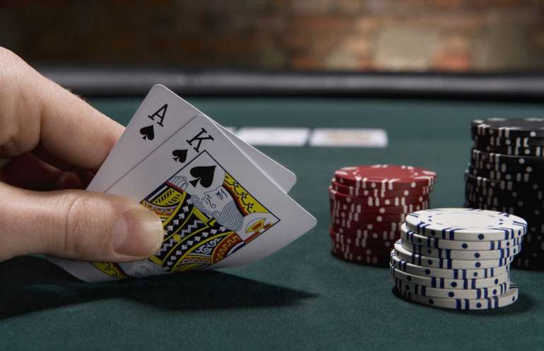 Gameplay at the card table in Back Betting Cards and chips in Back Betting