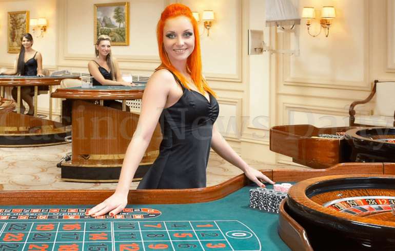 Croupier on casino roulette in External Hand Croupier on casino roulette in External Hand