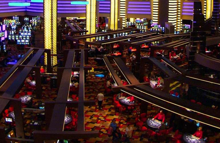 Hall of a traditional land-based casino in Gambling House Casino hall in Gambling House