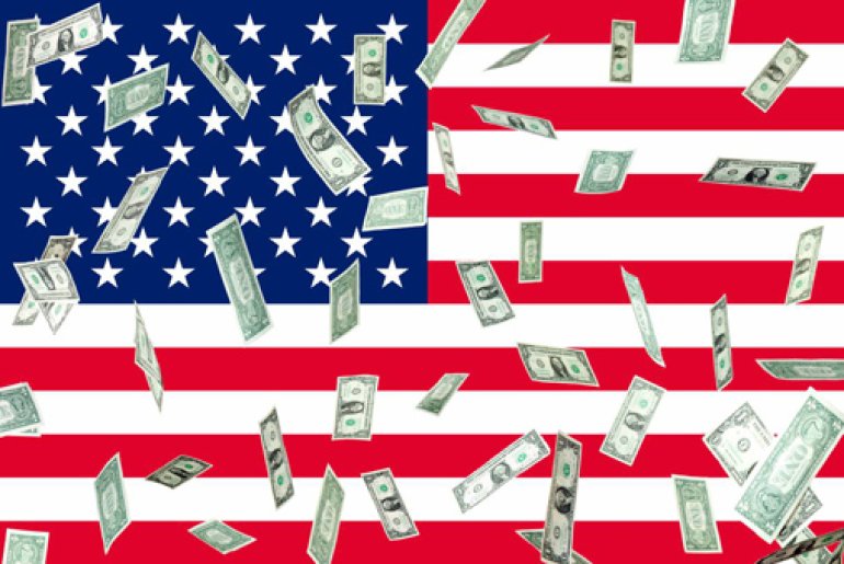 American flag and dollars